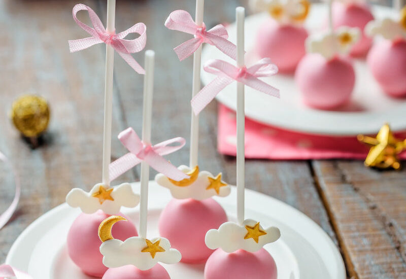 Cake pops are buttery cake crumbes into the frosting. It's cake and frosting mixed together to form a truffle-like ball. Pop a stick in it and dunk into the beautiful coating.